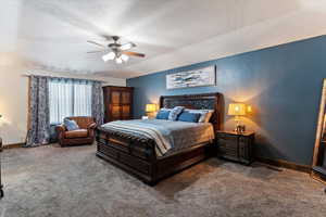 Bedroom with carpet floors and ceiling fan