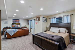 Bedroom featuring carpet flooring and recessed lighting