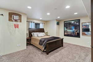 Bedroom featuring carpet and recessed lighting