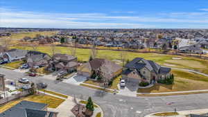 Aerial perspective of suburban area with a golf course