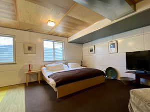 Bedroom featuring wood ceiling