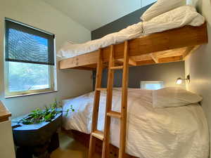 Bedroom with multiple windows