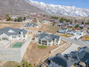 Aerial view of residential area with a mountainous background