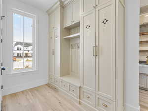Mudroom featuring light wood-style flooring