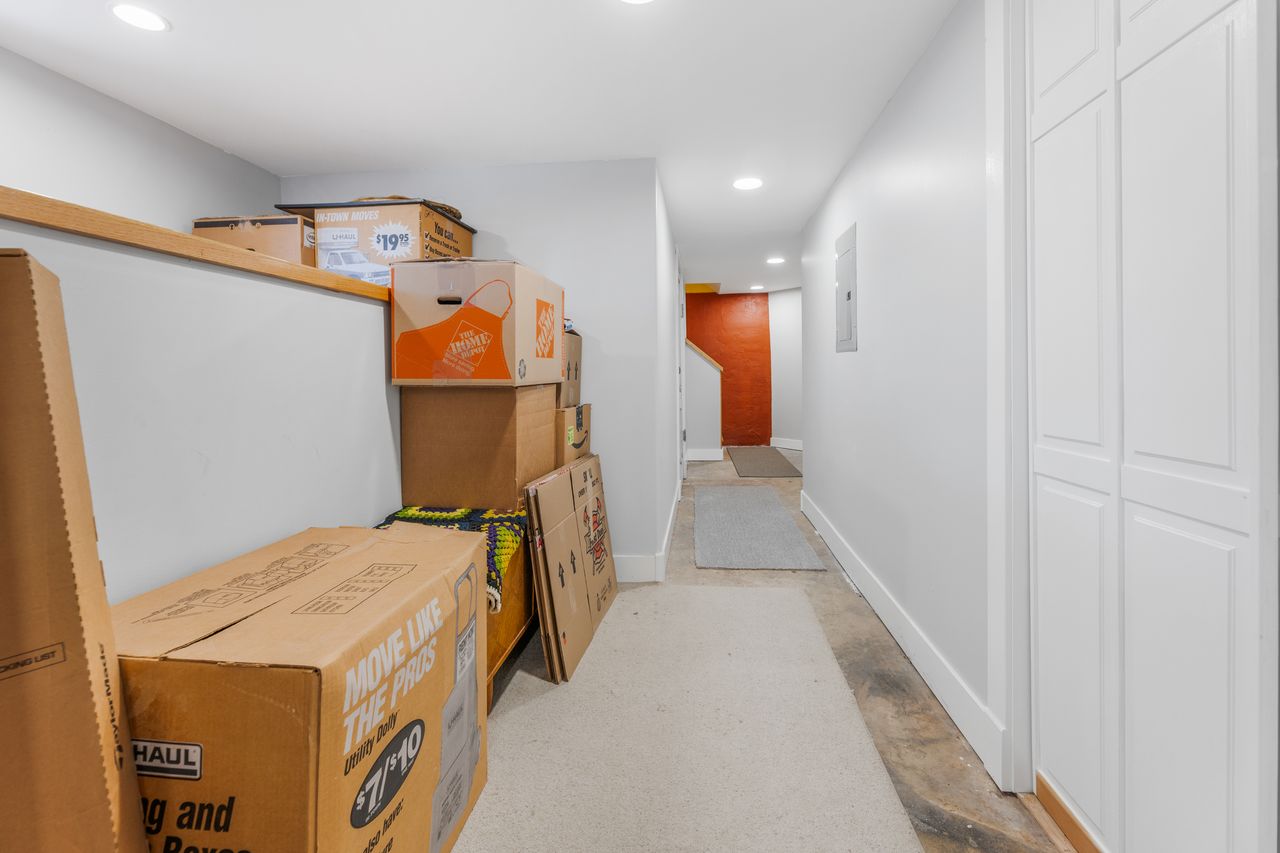 Storage room featuring electric panel