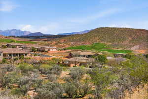 View of mountain backdrop featuring a local golf course