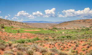 View of mountain backdrop featuring a local golf course