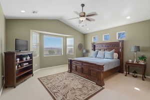 Bedroom with light carpet, recessed lighting, and a ceiling fan