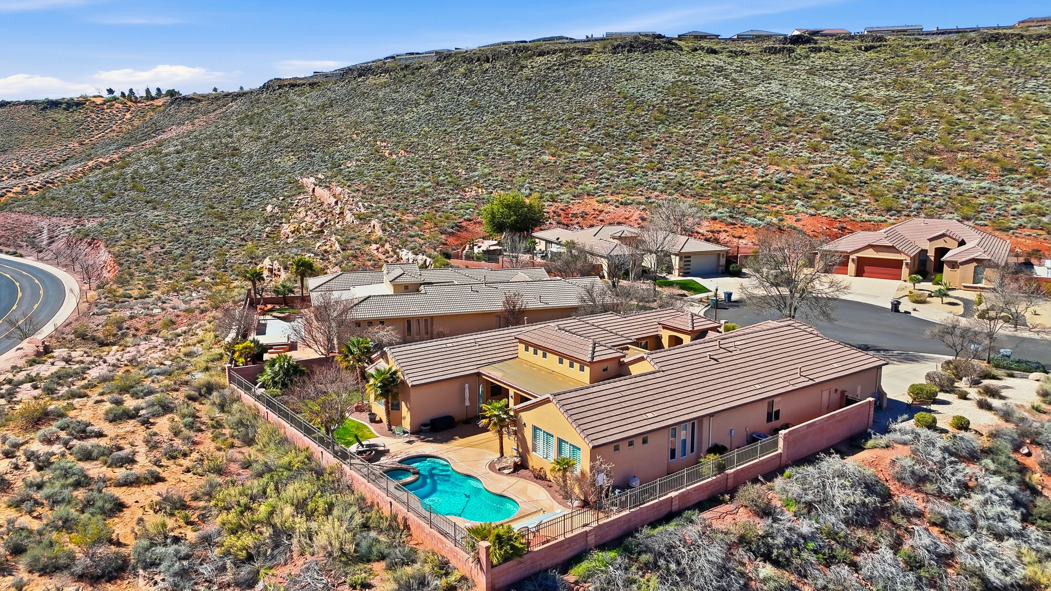 Aerial view of residential area featuring a pool area