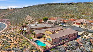 Aerial view of residential area featuring a pool area