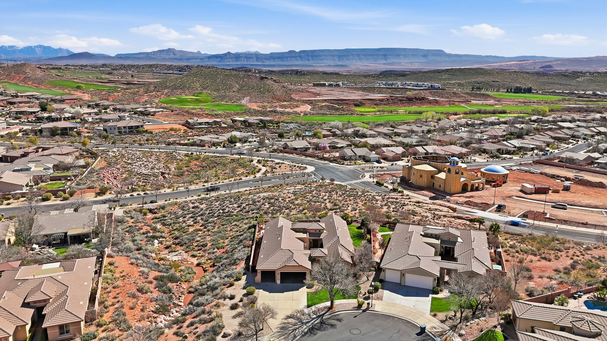 Aerial view of residential area with mountains