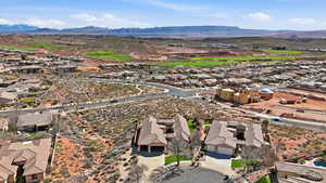 Aerial view of residential area with mountains