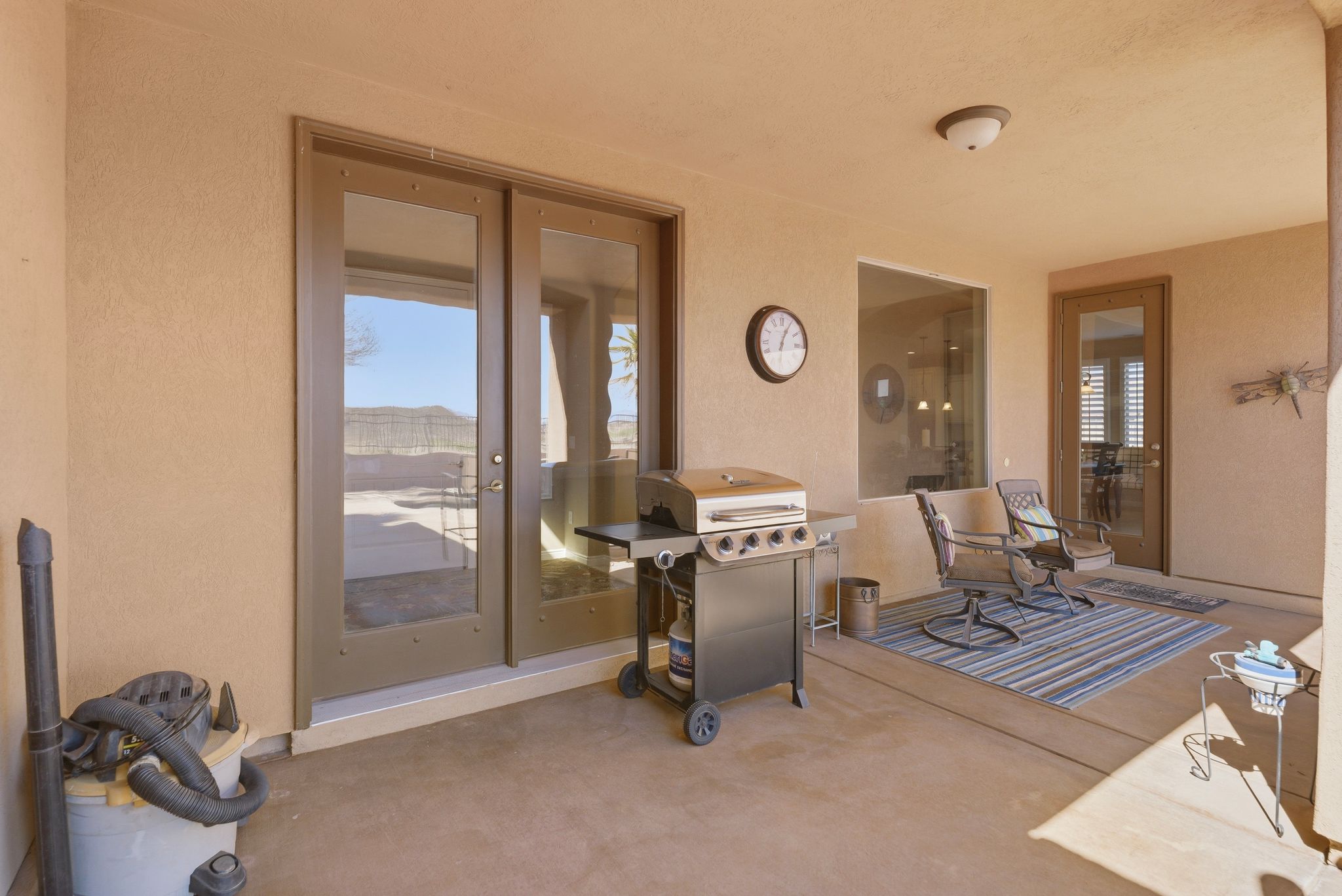 Sunroom featuring french doors