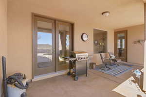 Sunroom featuring french doors