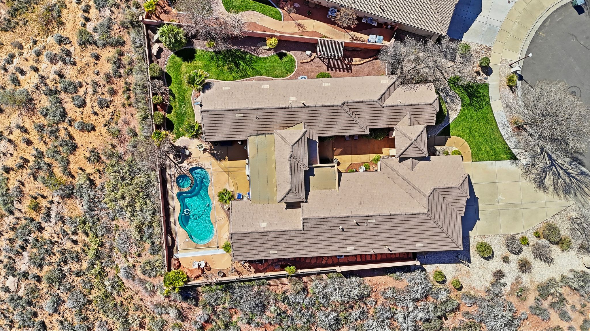 View from above of property featuring a pool area