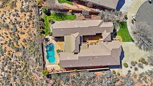 View from above of property featuring a pool area
