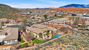 Aerial view of residential area with a mountainous background