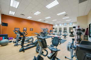 Exercise room featuring a drop ceiling