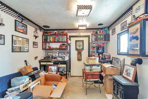 Office space with a textured ceiling