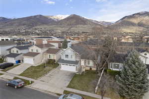 Aerial view of residential area with a mountainous background