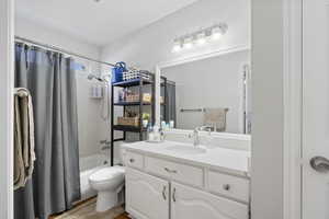 Full bathroom with vanity and shower / tub combo