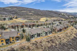 Aerial perspective of suburban area with mountains
