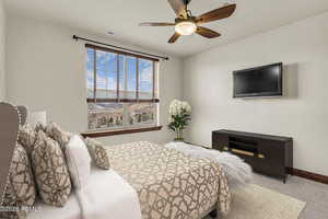 Bedroom with carpet floors and ceiling fan