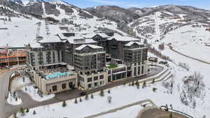 Snowy aerial view with a mountain view