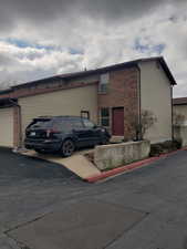 View of front of property with brick siding