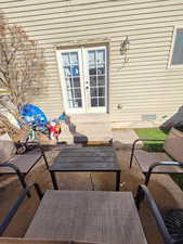 View of patio featuring french doors and entry steps