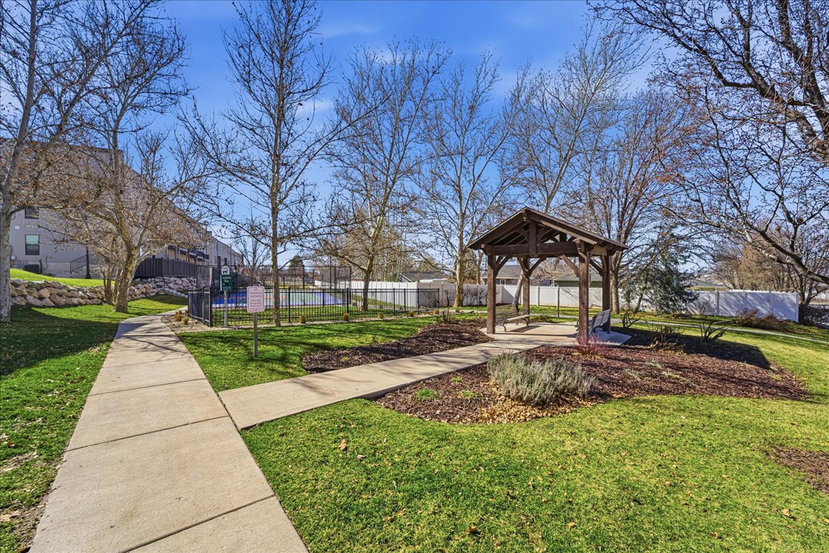 View of property's community featuring a patio area