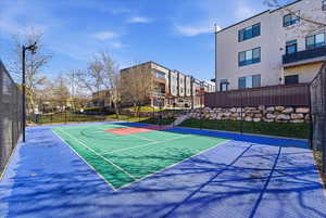View of basketball court featuring community basketball court