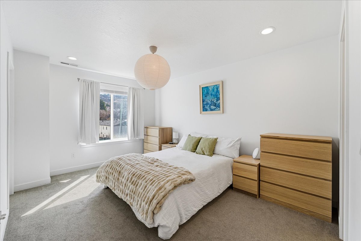 Bedroom with carpet and recessed lighting
