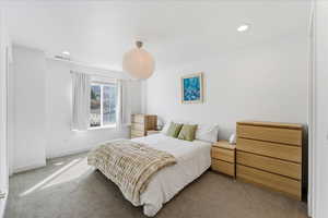 Bedroom with carpet and recessed lighting