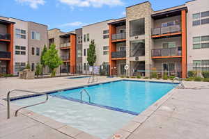Community pool featuring a patio area