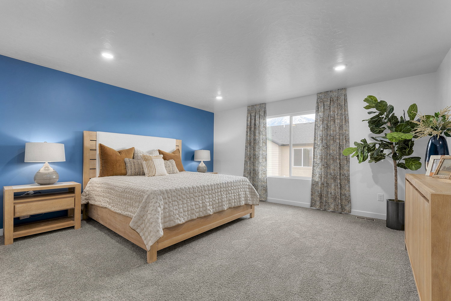 Carpeted bedroom featuring recessed lighting