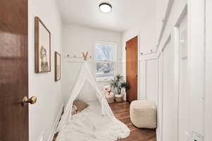 Playroom featuring wood flooring