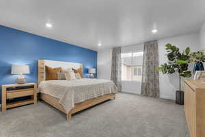 Carpeted bedroom featuring recessed lighting