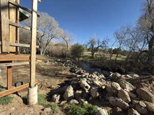 View of yard featuring a water view