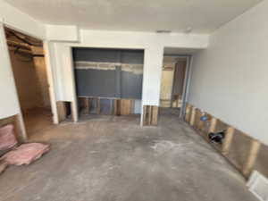 Unfurnished bedroom featuring two closets