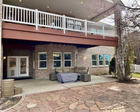 Lower Level covered & uncovered patios with lighting.