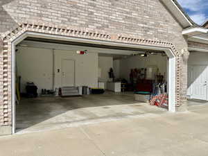 3 Car Garage with High Ceilings and an extended work bench area