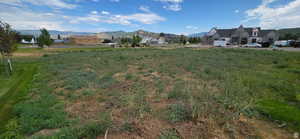 Northwest inside corner of lot facing South