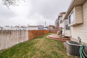 View of fenced backyard