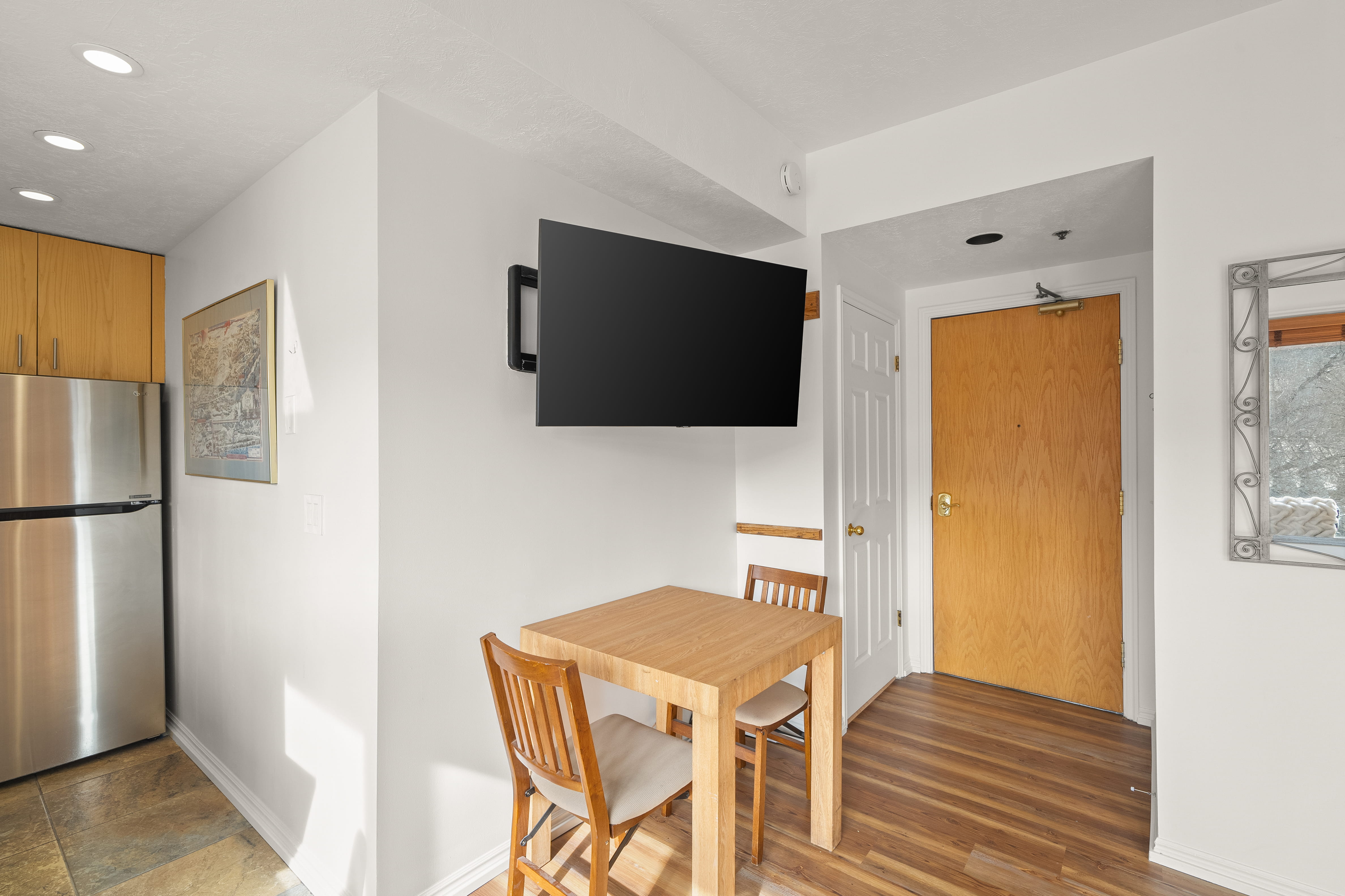 Dining room featuring baseboards and recessed lighting
