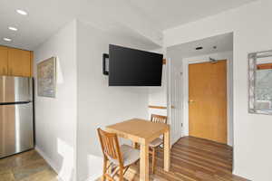 Dining room featuring baseboards and recessed lighting