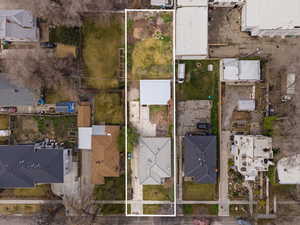 Aerial perspective of suburban area featuring property parcel outlined