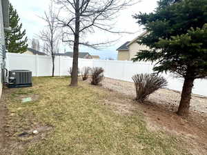 View of fenced backyard