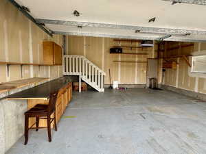 View of garage and epoxied floor