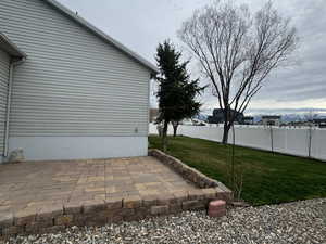 View of yard with a patio area